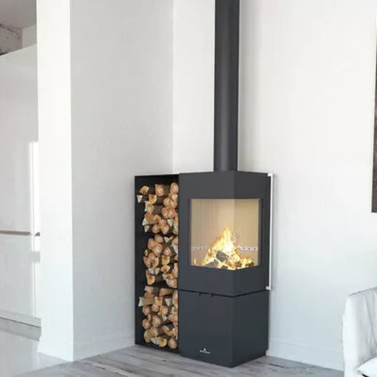 bronpi-bombay-e-stove in corner of white room