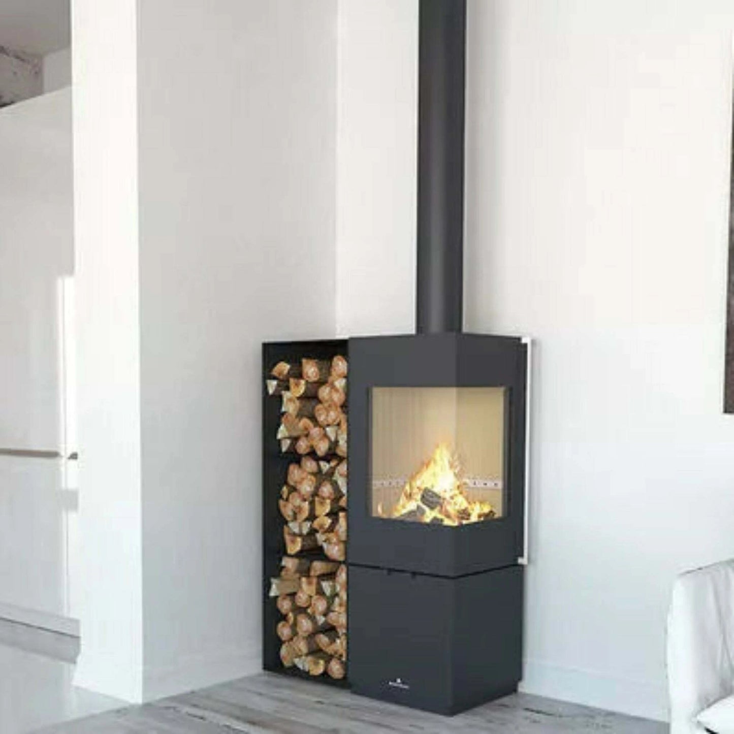 bronpi-bombay-e-stove in corner of white room