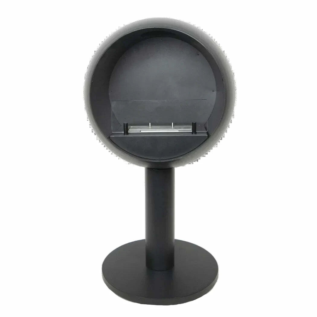 Black cylindrical bio-ethanol stove with a circular top on a white background