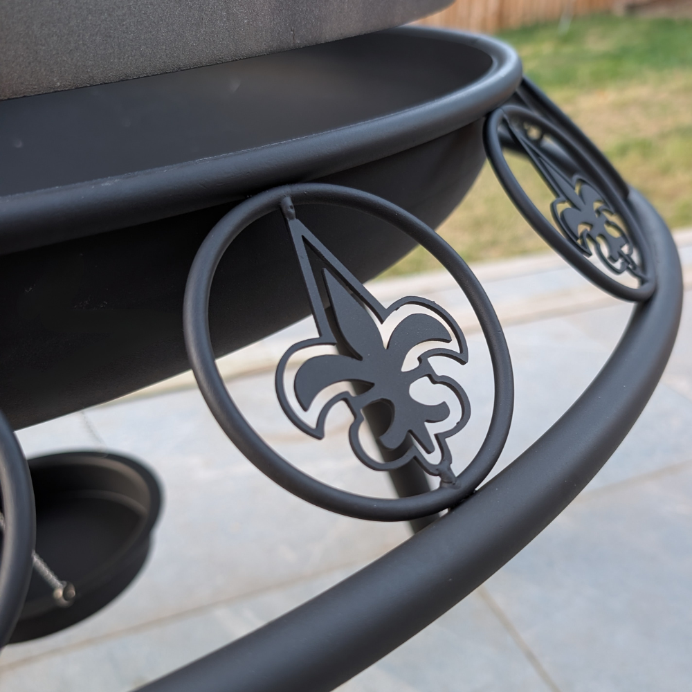 Ornate fleur-de-lis firepit edging detail