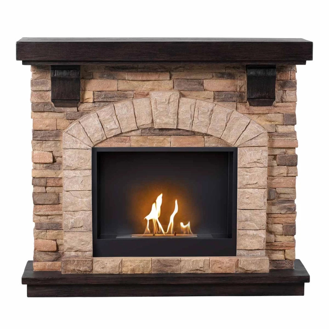Stone fireplace with a lit fire inside on a white background