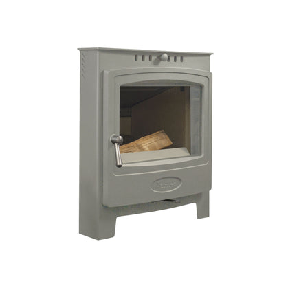 A gray cast iron wood-burning stove with a glass window showing logs inside, featuring a metal handle and a circular brand badge on the lower front.