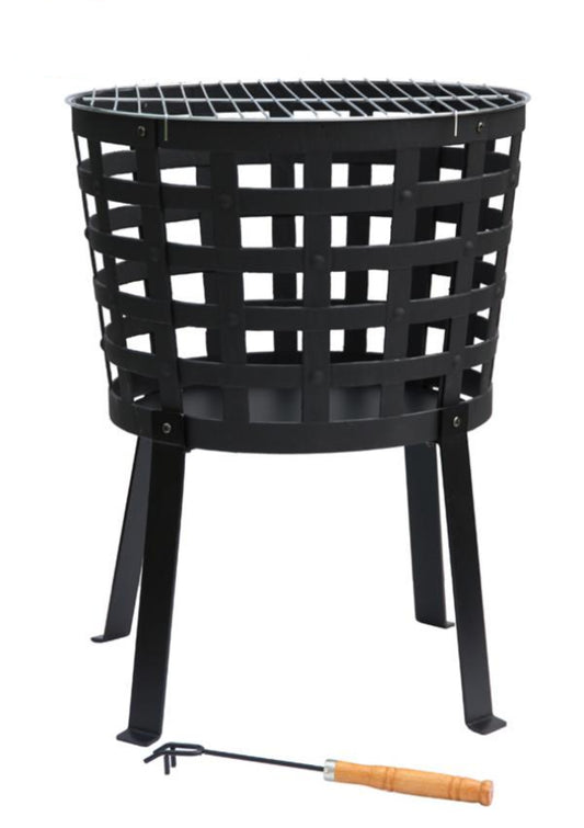 Black metal fire basket with a tool on a white background