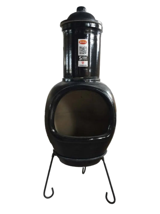 Black ceramic chiminea on a white background