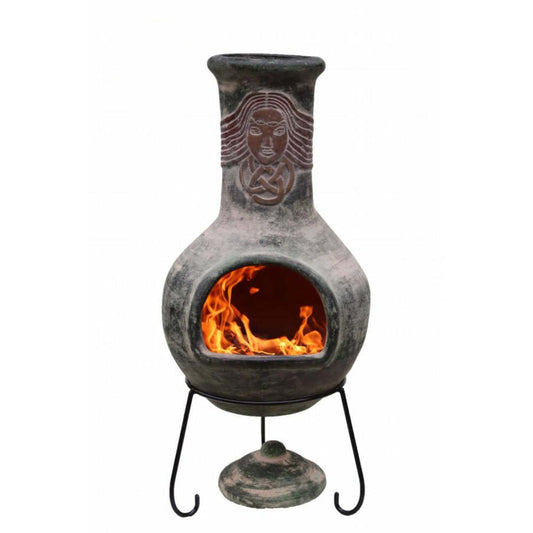 Ceramic chiminea with flames inside on a white background