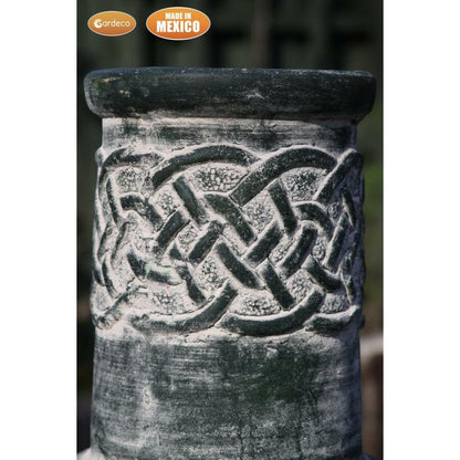 Chimenea close up Edyth Medium Celtic Mexican Chiminea Green | Clay on a blurred background.