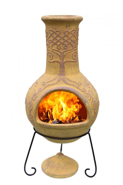 Terracotta chiminea with flames inside, made in Mexico, on a white background