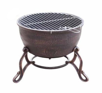 Cast iron fire pit with grill grate on a white background