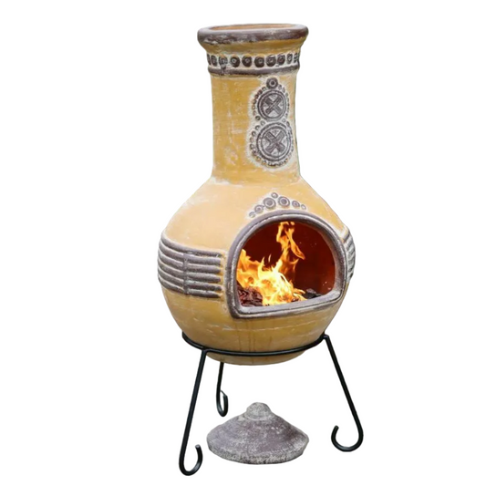 Yellow Ceramic chiminea with flames on a white background