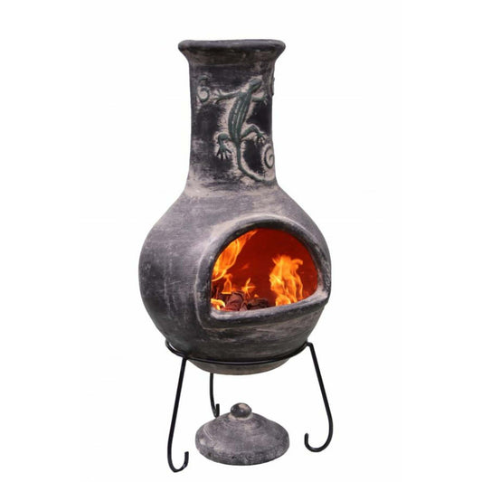 Ceramic chiminea with flames inside, featuring a lizard design, on a white background.