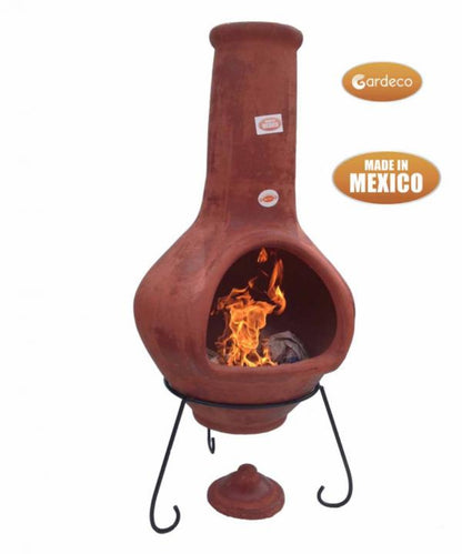 Terracotta chiminea with flames inside, made in Mexico, on a white background