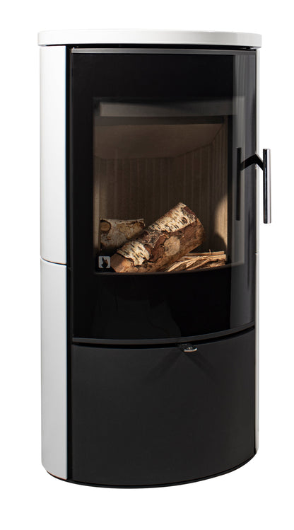 A modern cylindrical wood-burning stove with a black glass door showing logs inside, a black lower drawer front, and a white top and side panels, photographed on a plain white background.