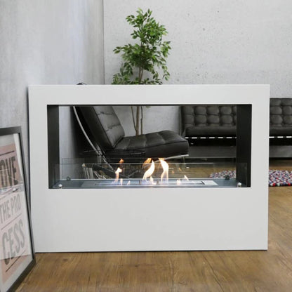 Modern two sided white fireplace with flames in a living room setting