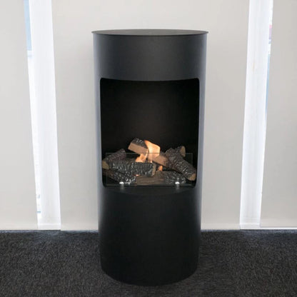 Modern black freestanding fireplace with visible flames and logs inside, set against a neutral background.