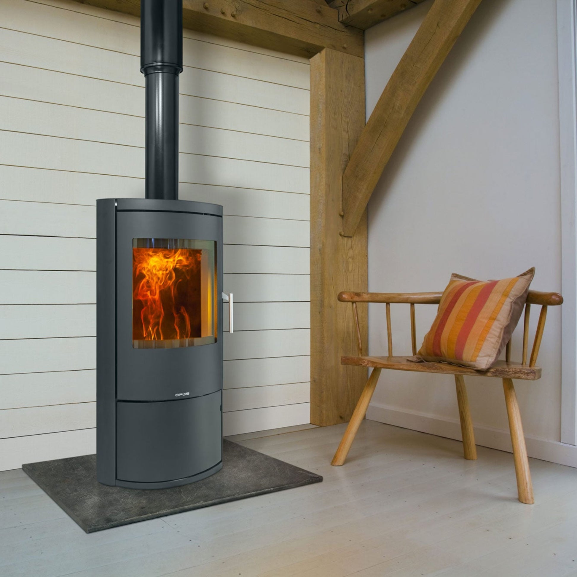 Opus Harmony D Stove in white room with chair