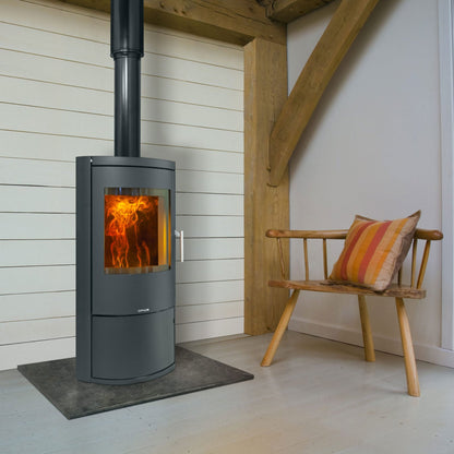 Opus Harmony D Stove in white room with chair