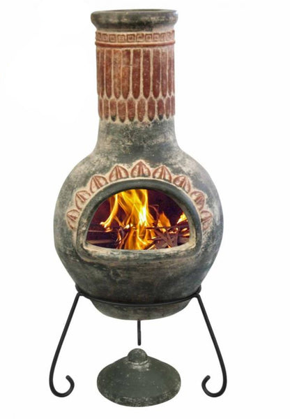 Decorative outdoor fireplace with flames, made in Mexico, on a white background