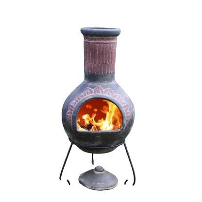 Ceramic chiminea with flames inside on a white background