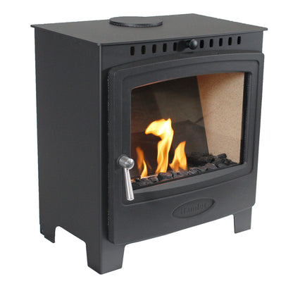 A black cast iron wood-burning stove with a glass window showing a fire, on a plain white background.