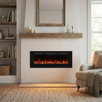 Titanite_127_cm electric fire in white chimney breast in room with chair and bookshelf