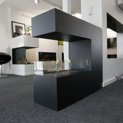 Modern black fireplace in a living room setting