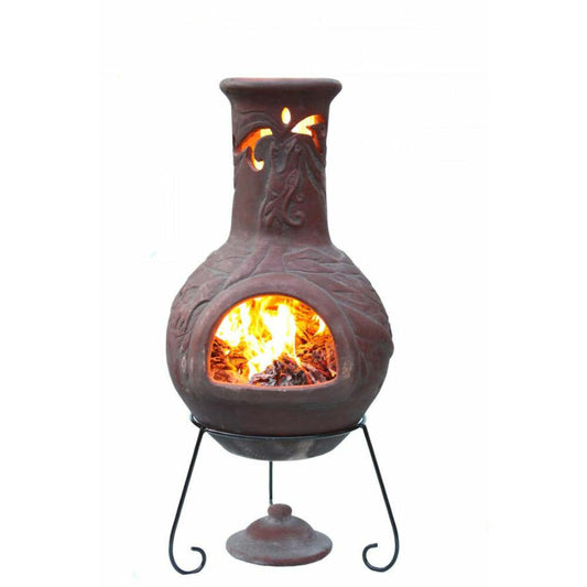 Decorative outdoor fireplace with flames inside, made in Mexico, on a white background.