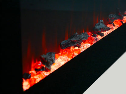 Close-up of glowing embers and flames in a fireplace