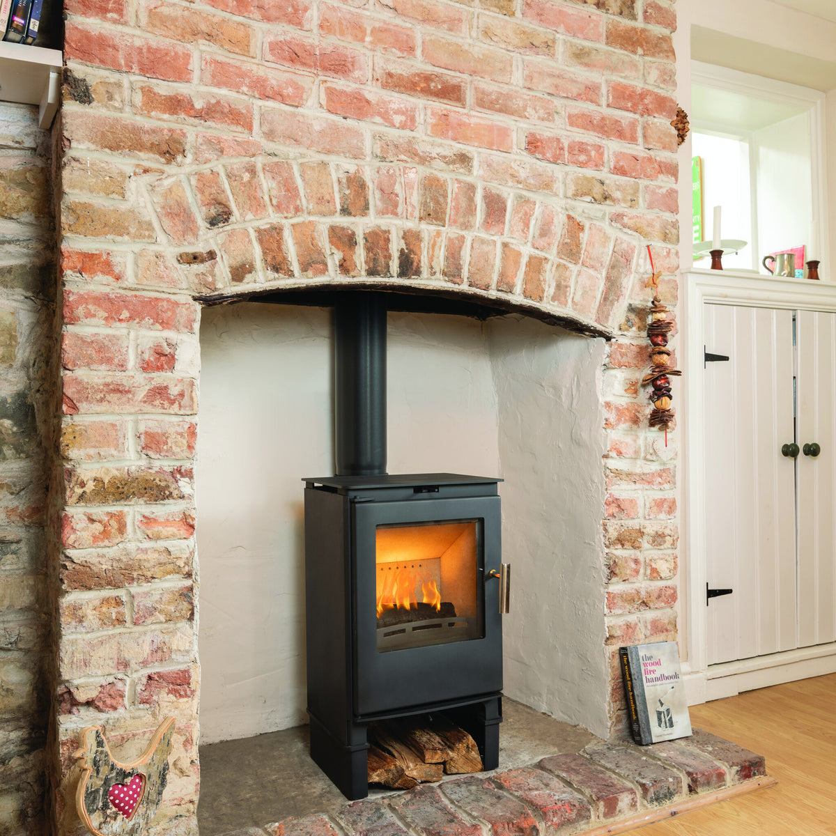 Beltane Brue Logstore Convector Plus in a room setting