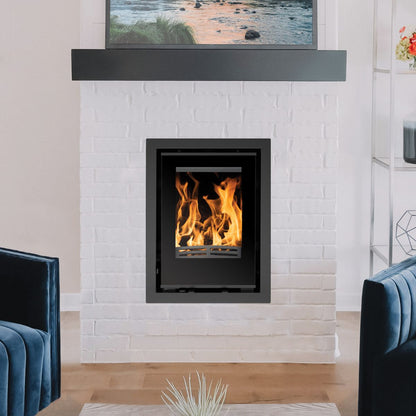 Bristol Stove Co Explorer 5iG inset multifuel stove with 4-sided frame installed in a fireplace