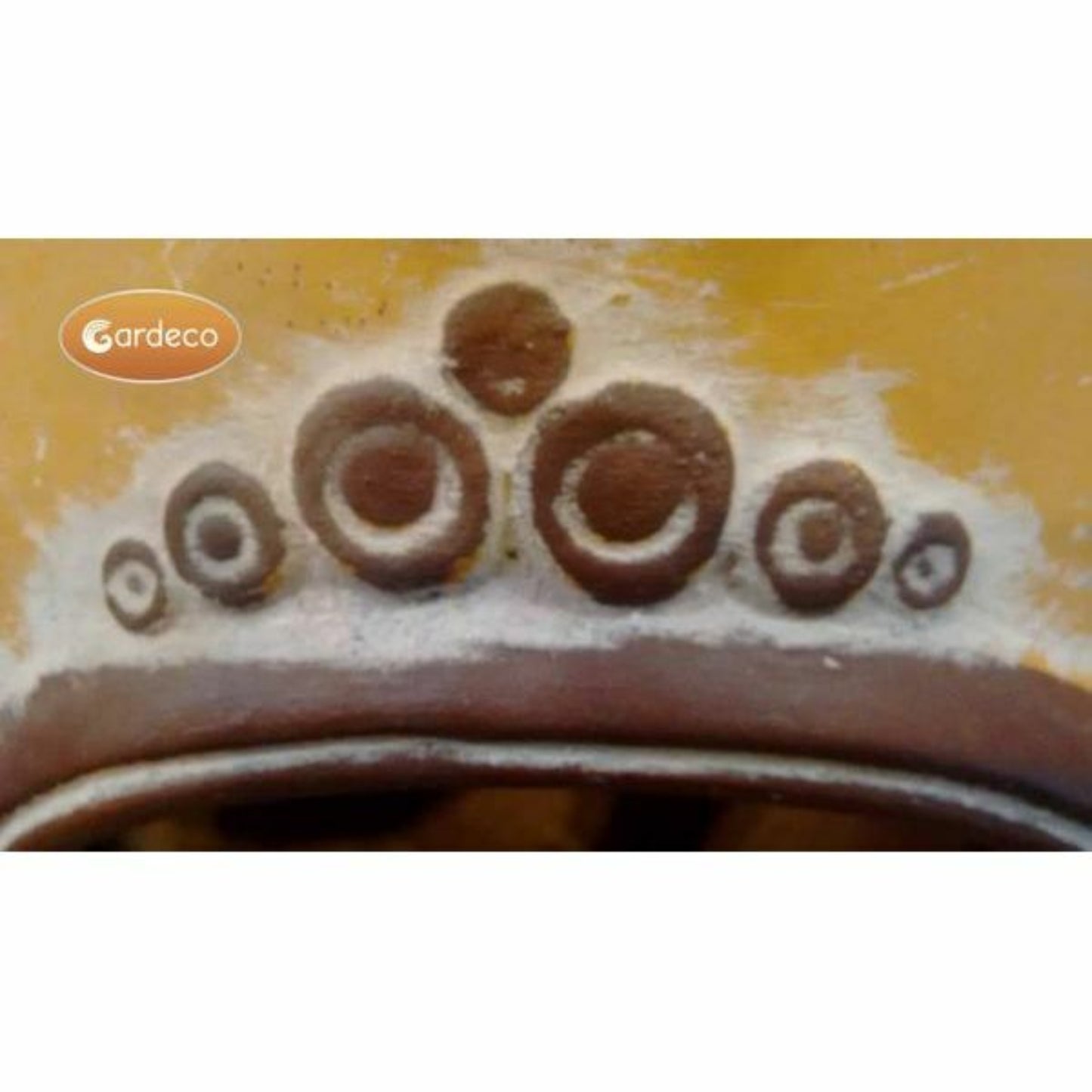 close up of detail on Extra-large Azteca Mex chimenea in yellow on white background