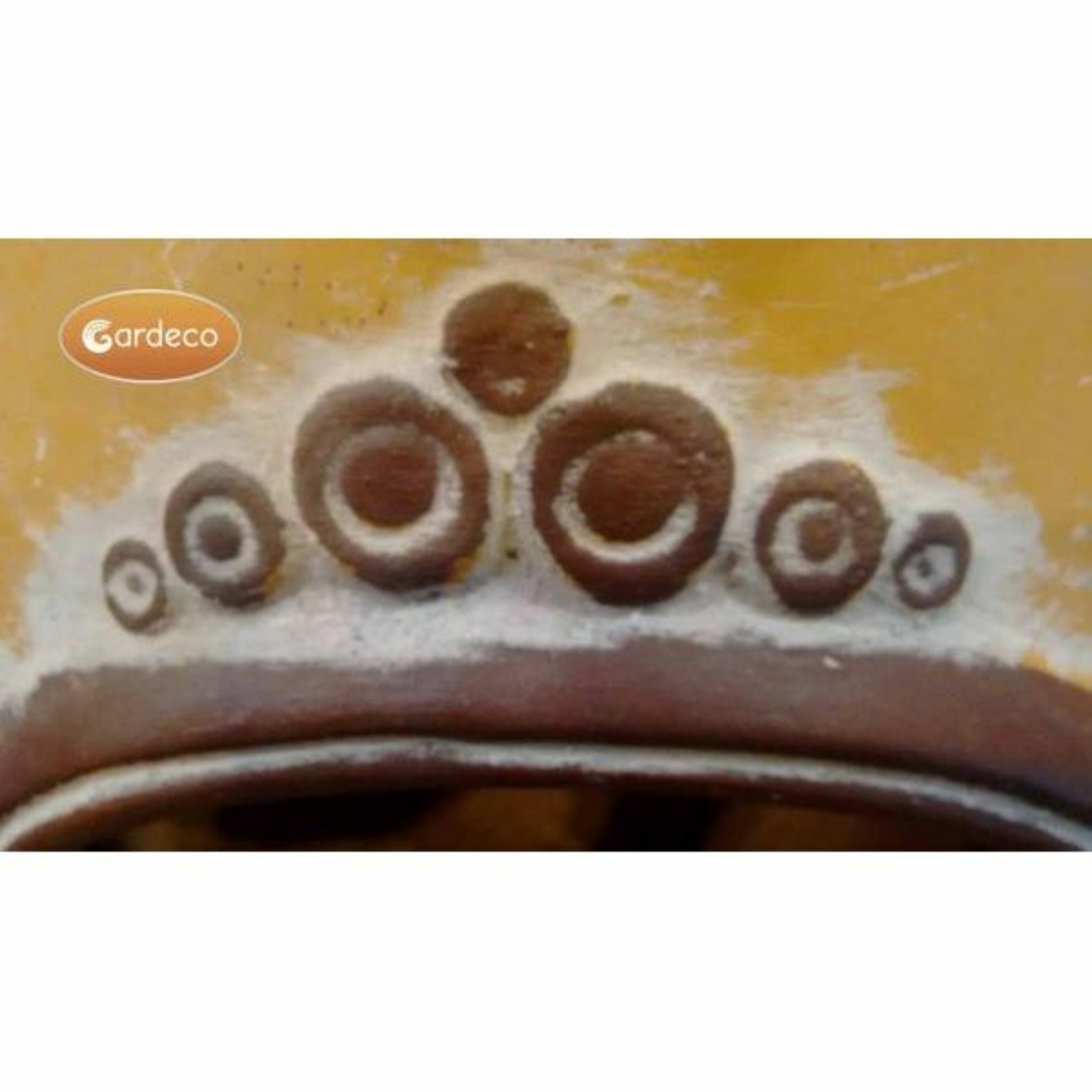 close up of detail on Extra-large Azteca Mex chimenea in yellow on white background