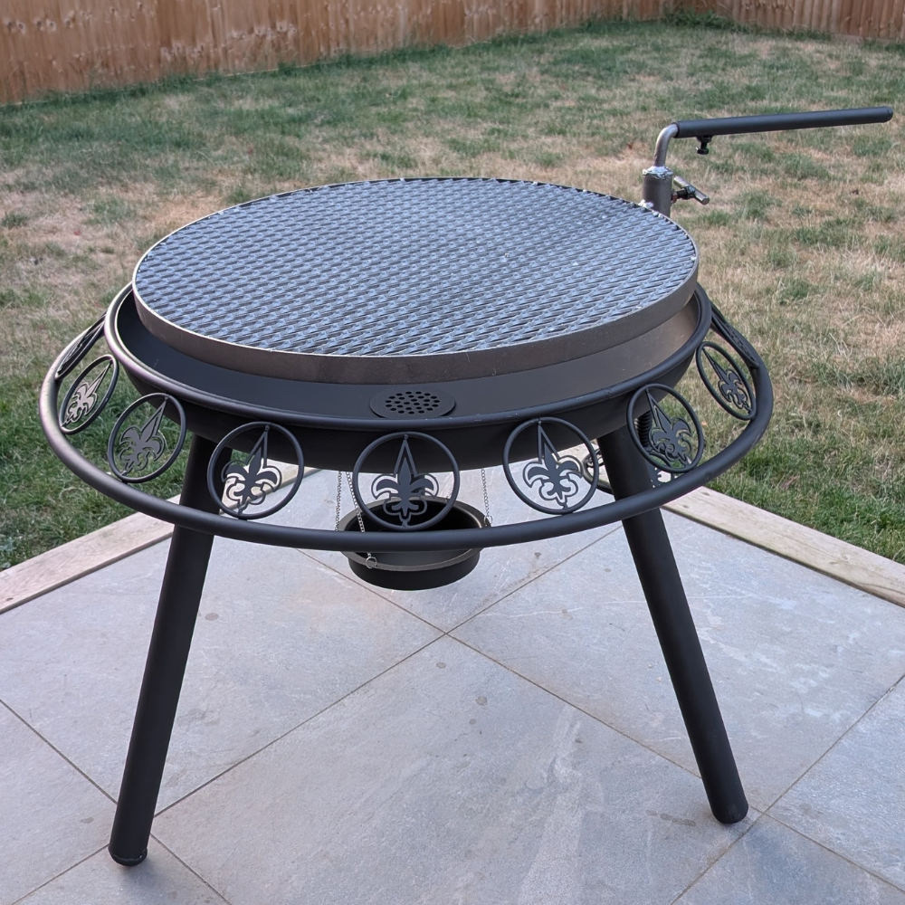 Ornate firepit and swing-arm grill alternate view