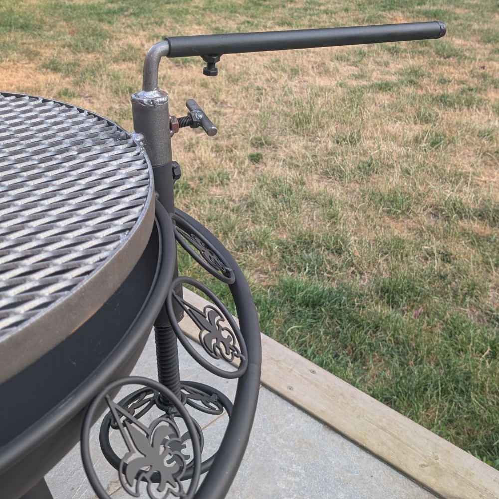 Adjustable-height swing-arm BBQ rack detail