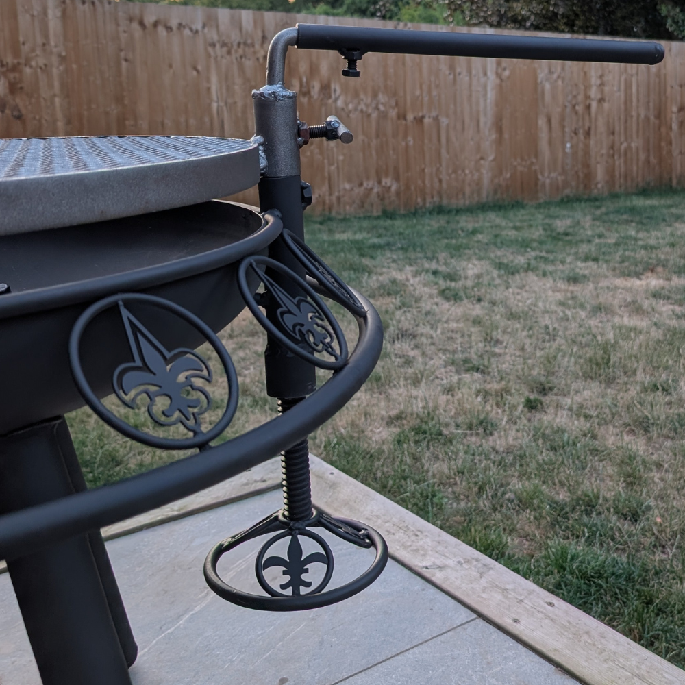 Firepit swing arm and drip pan detail