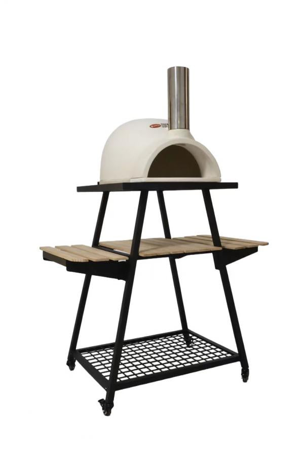 White outdoor pizza oven on a trolley on a stand with a black base and wooden shelf.