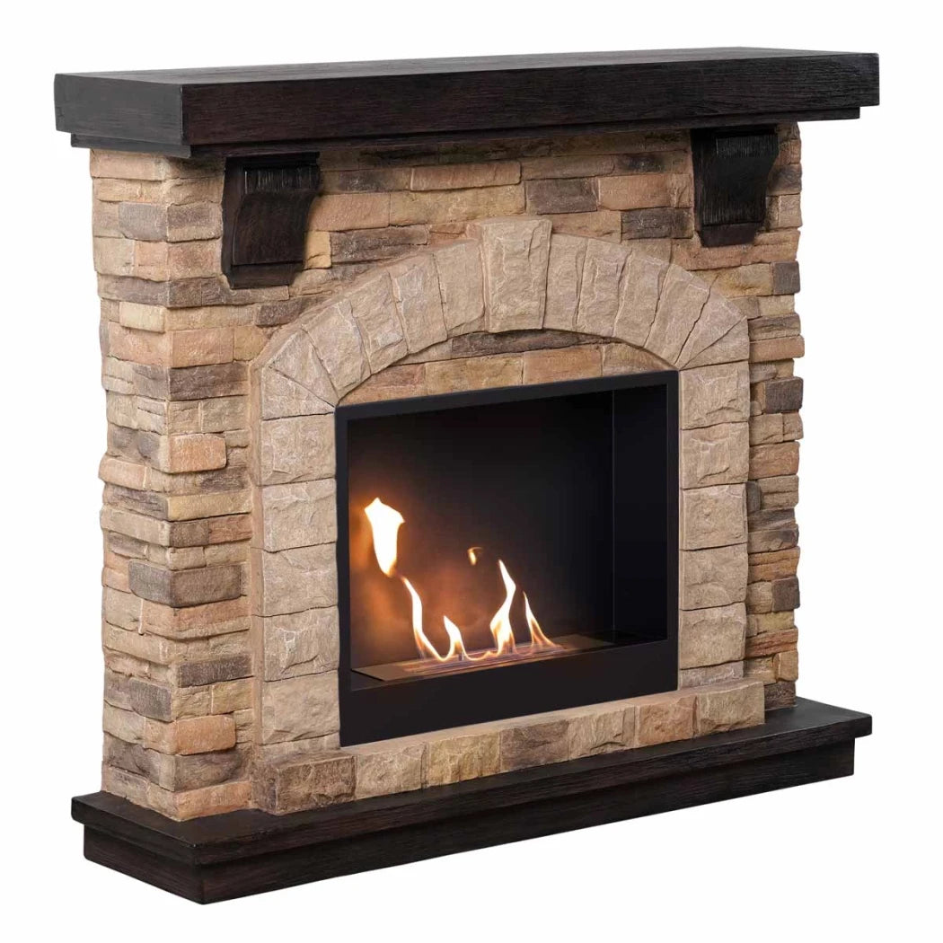 Stone fireplace with a lit fire on a white background