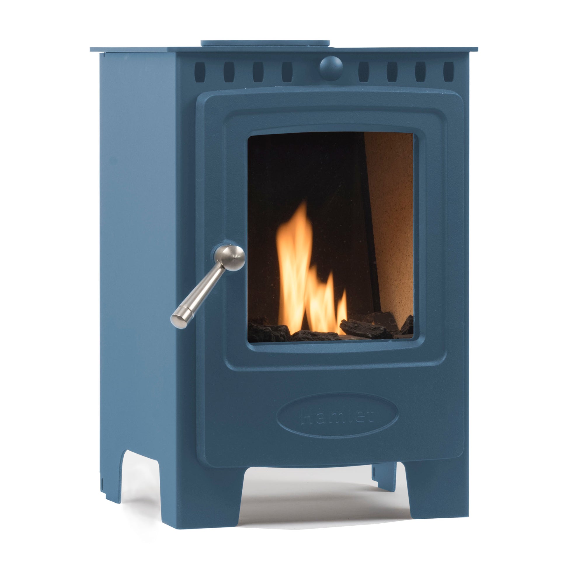 A blue cast iron wood-burning stove with a glass door showing a lit fire, featuring a silver metal handle and the brand name 'Hamlet' embossed on the lower front.